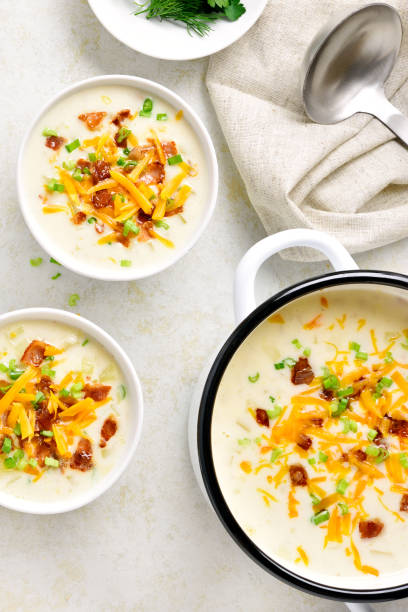 istock Potato creamy soup with bacon and cheddar cheese 1305845599