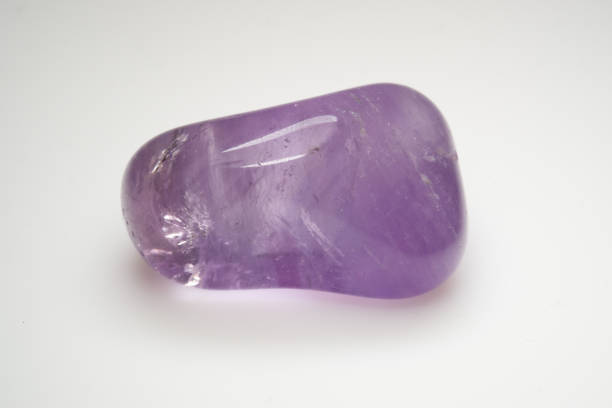 istock Natural stone amethyst on white background 1305846929