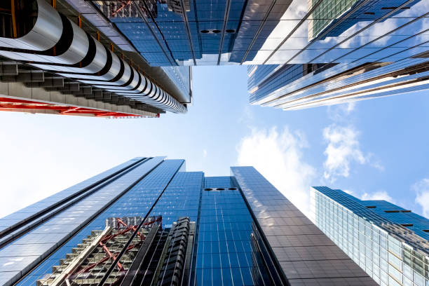istock Low angle view of modern office buildings, skyscrapers, sky background with copy space 1305847817