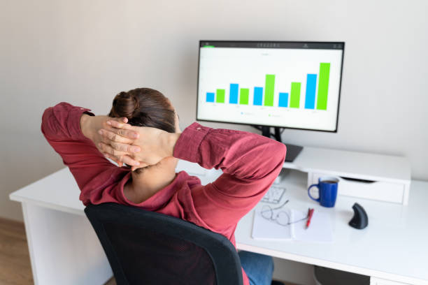 istock A woman following data about her work on her home computer 1305852249