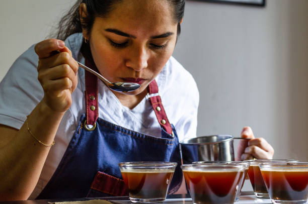 Professional coffee taster testing new smells and flavors.