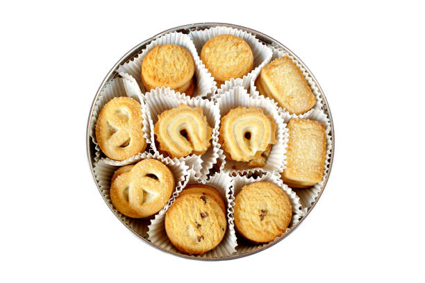istock Danish butter cookies in box isolated on white background 1305856900
