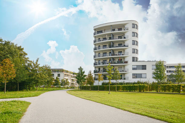 cityscape of a residential area with modern apartment buildings, new green urban landscape in the city - madrid built structure house spain imagens e fotografias de stock