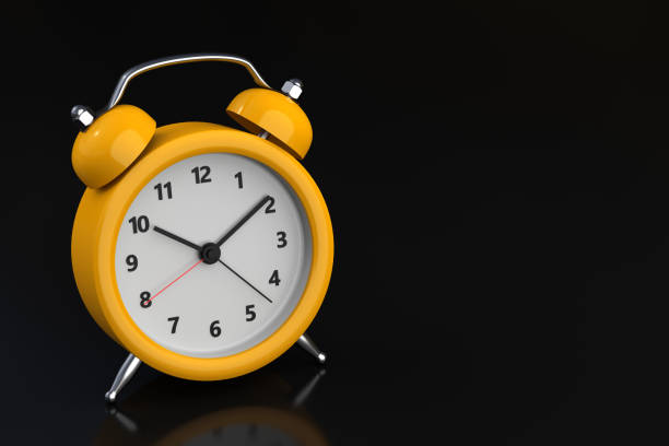 istock Close up red alarm clock on black background. 3d rendering 1305860143