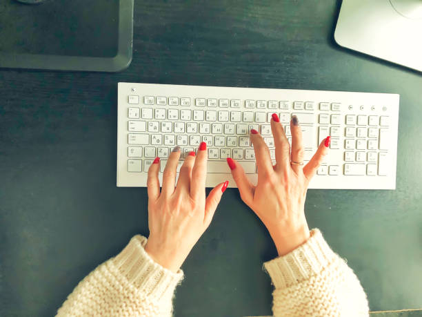 istock female hands on a computer keyboard. soft selective focus. mobile photography 1305867201