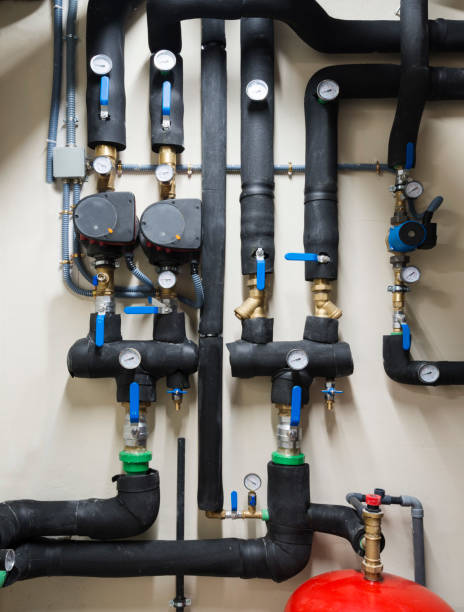 istock piping and valves of a building heating system 1305872784