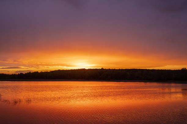 istock Sunset and Reflection on the Lake in Lithuania 1305873971