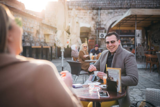 istock Smiling businessman drinking coffee 1305880649