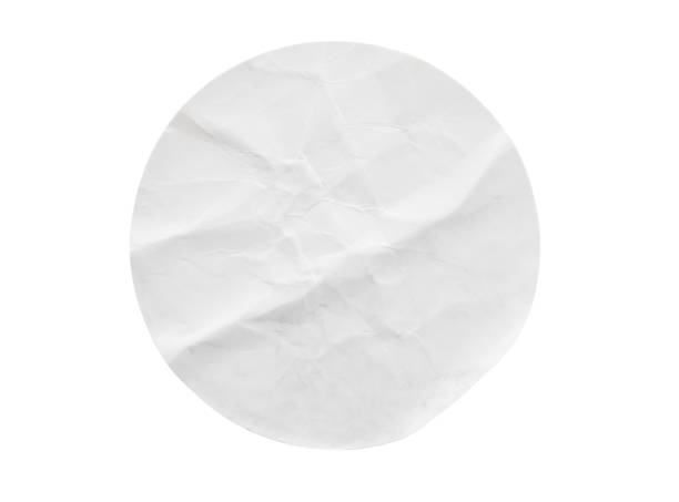 istock Blank white round paper sticker label isolated on white background 1305883575