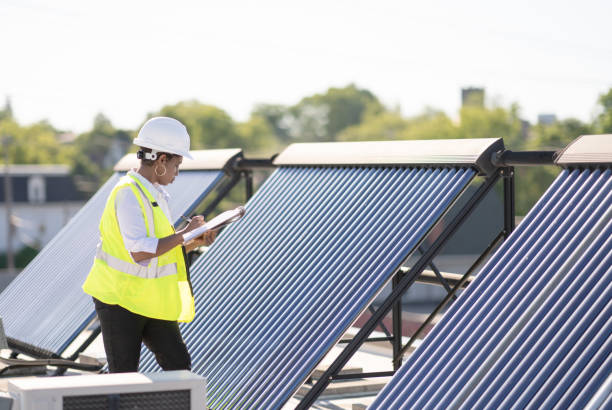 istock Female Engineer Working With Solar Panels Stock Photo 1305883927
