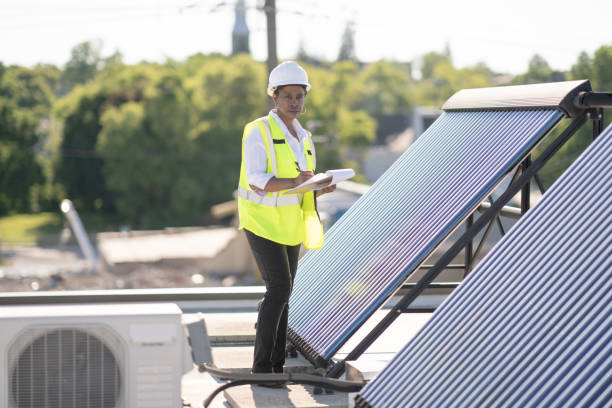 istock Female Engineer Working With Solar Panels Stock Photo 1305883949