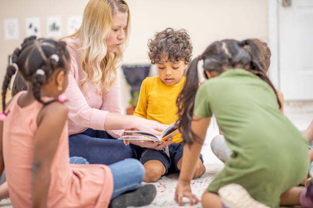 istock Story Time In Class Stock Photo 1305885413