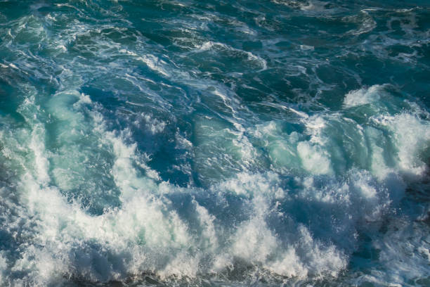 istock Ocean waves as background. Navy blue, beautiful blue and turquoise colors 1305895442