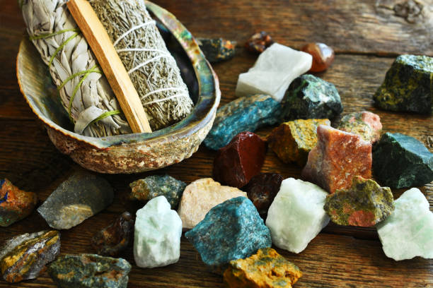 istock Several Rough Healing Crystals and White Sage Bundles 1305895553