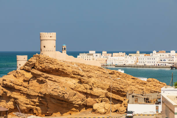 istock Tower at the harbor entrance in Sur, Oman. 1305896219