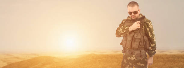istock Soldier on desert background .Concept Army Forces . 1305898049