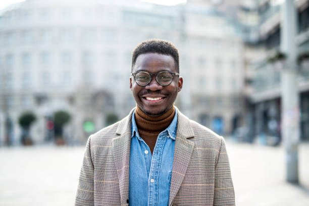 istock Happy African American while collar worker looking at camera. 1305900912