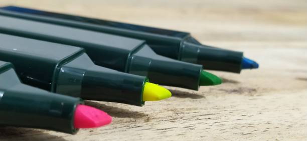 istock Highlighter OR marker on wooden table 1305901060