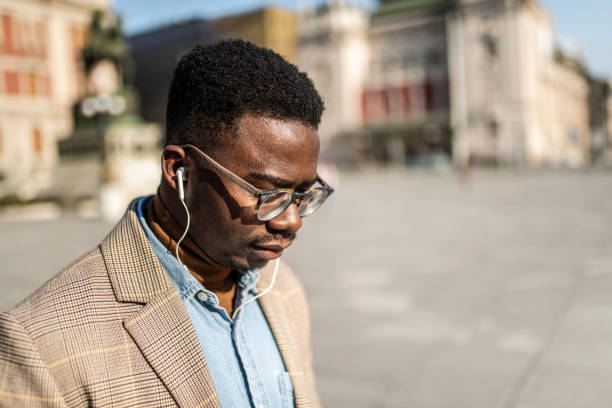 istock Distraught African American businessman looking down. 1305901095