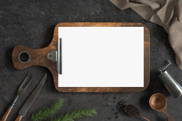 istock Menu mockup with knife and fork on a Concrete background, Free space for your text 1305902828