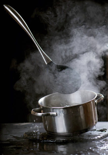 istock splash of water in a pan. Abstract background 1305908837