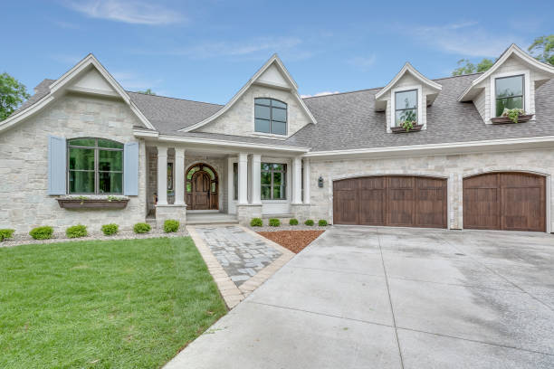 istock Craftsman home with three car garage 1305909513