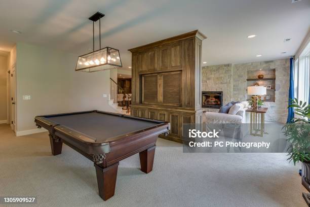 Game Room In Basement Of New Home Stock Photo - Download Image Now - Basement, Home Addition, Carpet - Decor