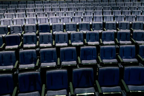 Photo of Empty Auditorium purple seats