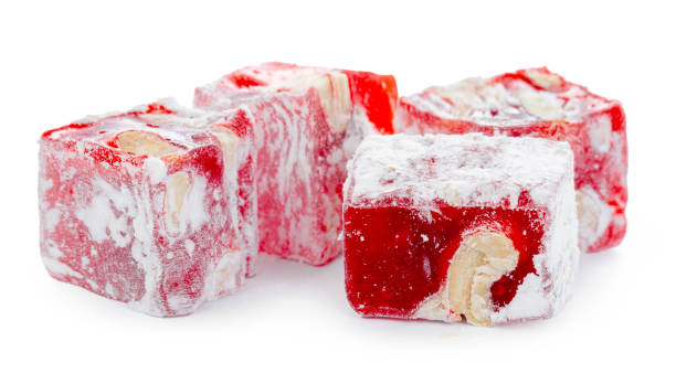 istock Close up of red Turkish Delight sweets isolated on white 1305913698