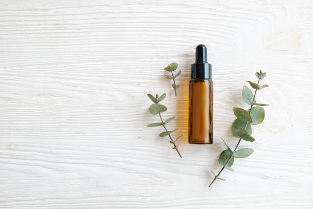 istock Cosmetic products on textured background. 1305915981