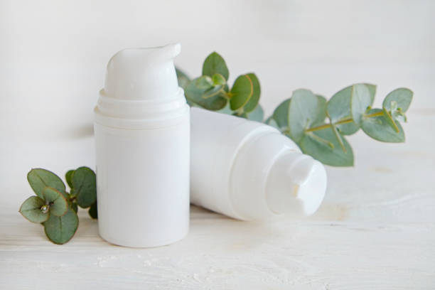istock Cosmetic products on textured background. 1305916027