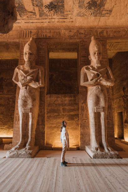 istock Woman walking inside  Abu Simbel temples 1305921573