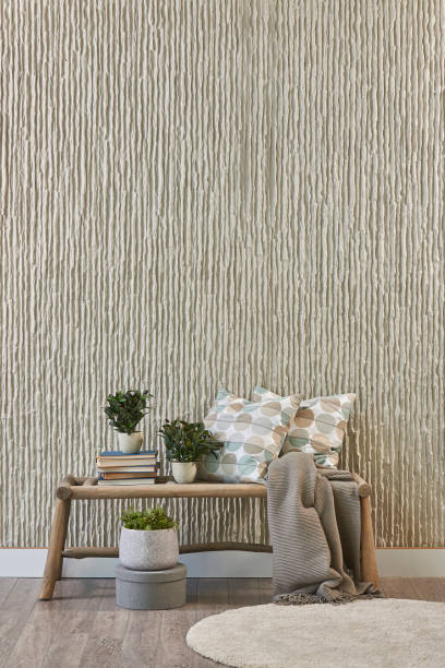 istock modern living room textured wall with table blanket and plant 1305921807