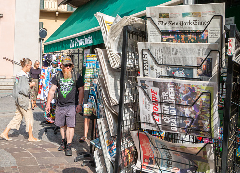 Hanoi, Vietnam - March 12, 2016: Many title of Vietnamese newspapers for sale at a news stand in Hanoi capital street.