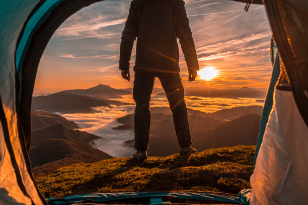 istock Orange sunrise from inside the tent. Basque Country 1305927143