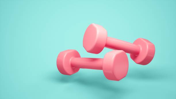istock 3D rendering Pink Dumbbells for sports isolated on blue background 1305928383