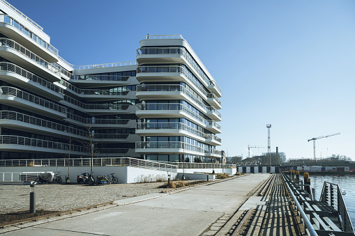 new residential architecture at spree river promande in berlin under blue sky