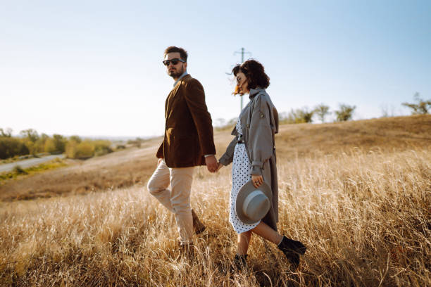 istock Stylish and loving couple enjoying each other outdoors.  Springtime. 1305928551