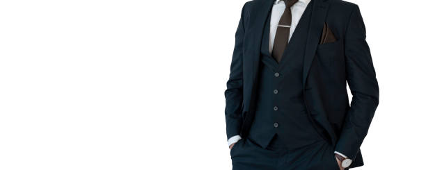 istock Businessman in suit isolated on white hands in pocket 1305929351