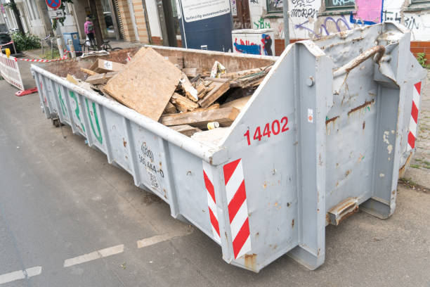 Container for household trash removal Berlin, Germany - June 8, 2020: Construction dumpster for residential debris removal or loaded dumpster overflowing trash dumpster stock pictures, royalty-free photos & images