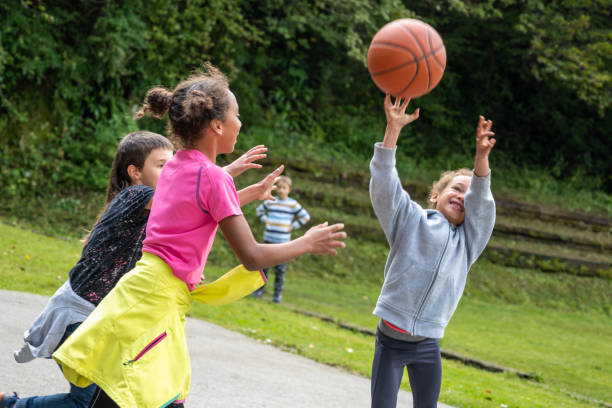 istock Children playing basketball 1305932163