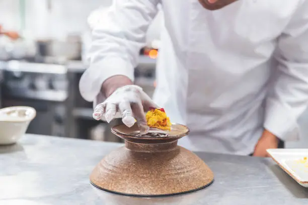 Indian Snacks called Papdi Chat been platted by a professional chef in an Indian restaurant