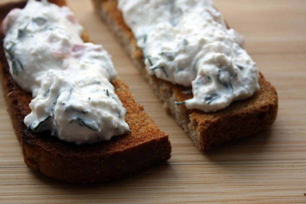 istock Cottage cheese dip and black bread toast. Breakfast. 1305932774