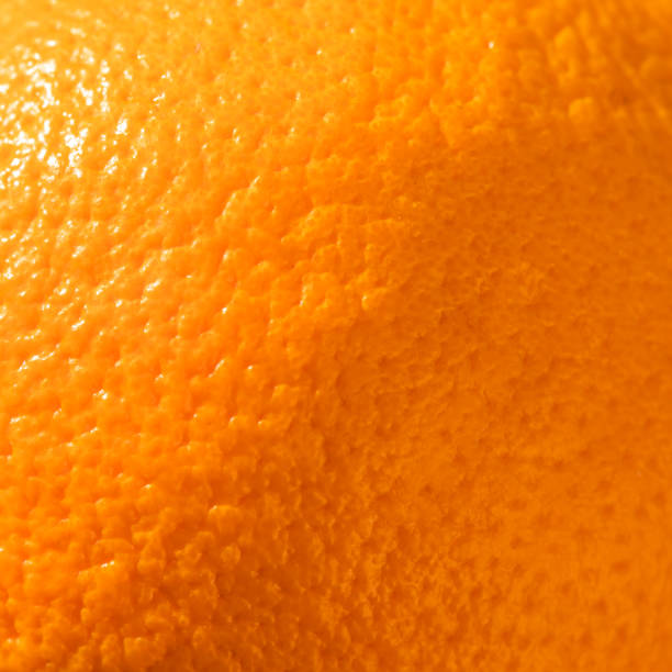 istock Ripe orange peel background. Close up view 1305933995