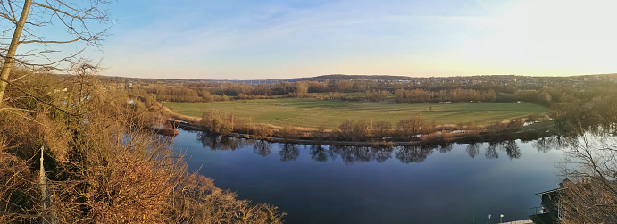 panoramic view over the valley of the Ruhr in Muelheim in the evening sun, springtime