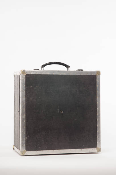 istock Vintage black suitcase on white background old 1305937849