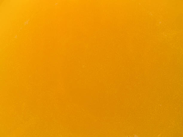 istock food background: sunflower honey close up - texture 1305937938