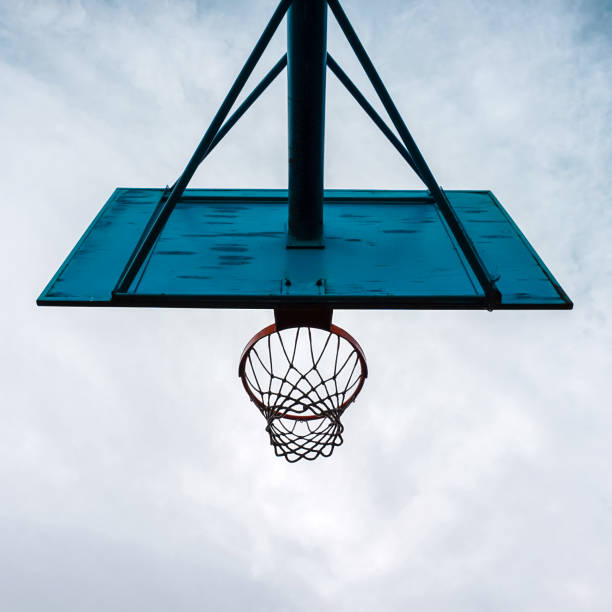 istock street basket hoop and blue sky 1305938722