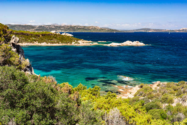 Colourful Early Summer View of the Northern Coast of Sardinia With Baia Sardinia, Capo d’Orso, Distant Island of La Madallena and Turquoise Mediterranean. - fotografia de stock