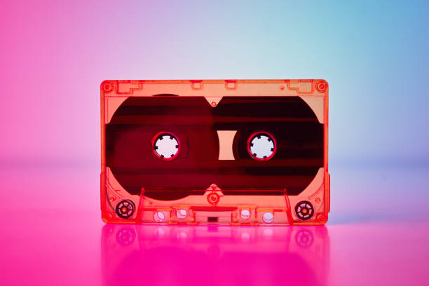 istock Retro cassette tape on a colorful neon background 1305941702